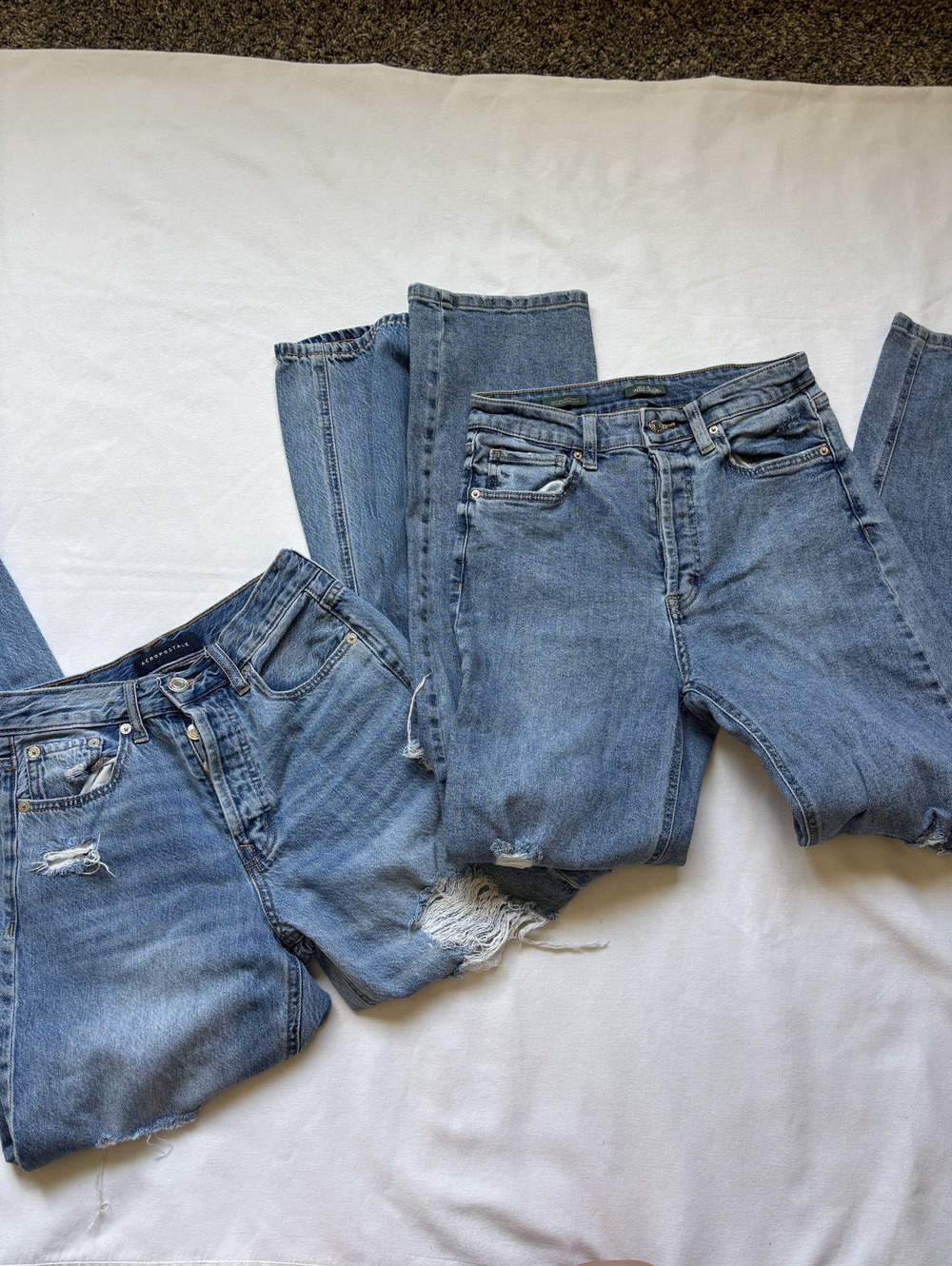 Bundle of jeans- 2 pairs mid/high rise ripped jeans size 2/4